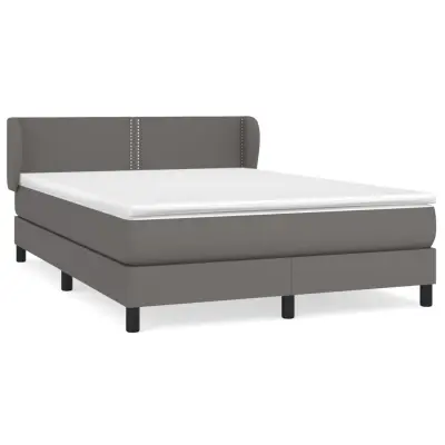 vidaXL Box spring postelja z vzmetnico siva 140x190 cm umetno usnje
