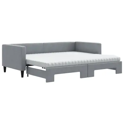 vidaXL Izvlečna dnevna postelja z vzmetnicami sv. siva 90x190 cm blago