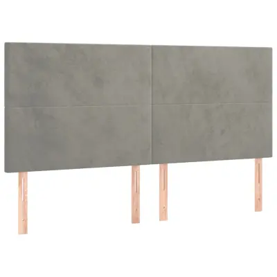 vidaXL Posteljno vzglavje 4 kosa svetlo siv 100x5x78/88 cm žamet
