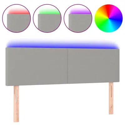 vidaXL LED posteljno vzglavje svetlo sivo 144x5x78/88 cm blago