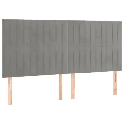 vidaXL Posteljno vzglavje 4 kosa svetlo siv 100x5x78/88 cm žamet