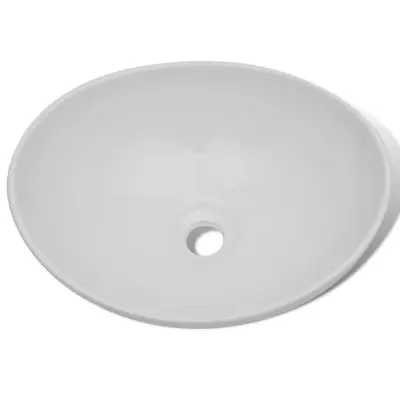 vidaXL Keramični umivalnik 40x33 cm ovalni bele barve