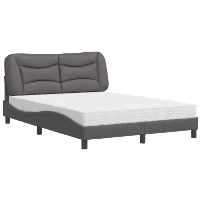 vidaXL Postelja z vzmetnico siva 140x190 cm umetno usnje