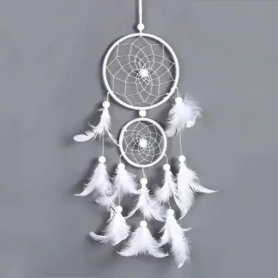 Lovilec sanj s perjem Beli