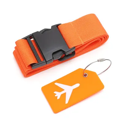 Prtljažni pas z nalepko z naslovom Orange