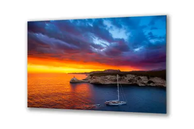 Slika na steklu skale morje obzorje čoln okrasna slika 130x83 cm