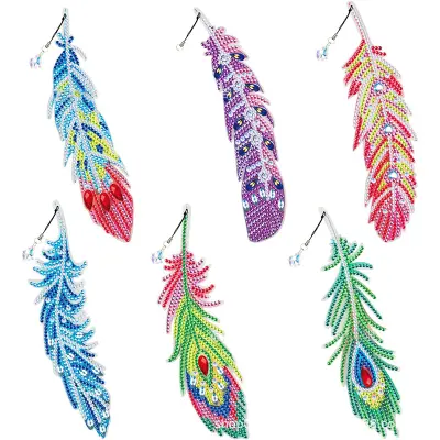 Zaznamek z okrasnimi kamenčki iz perja