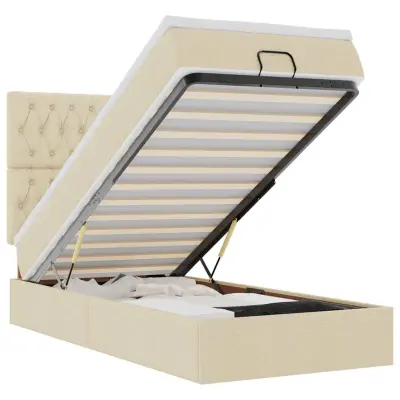 vidaXL Otomanska postelja z vzmetnico krem 90x200 cm blago