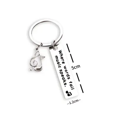 Obesek za ključe z notami iz nerjavečega jekla za nahrbtnike