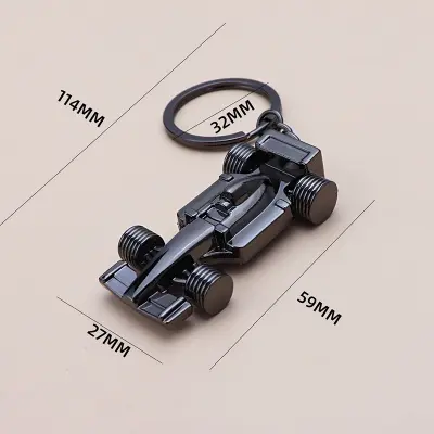 Obesek za ključe - Dirkalnik