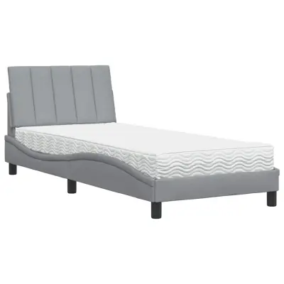 vidaXL Postelja z vzmetnico svetlo siva 90x200 cm blago