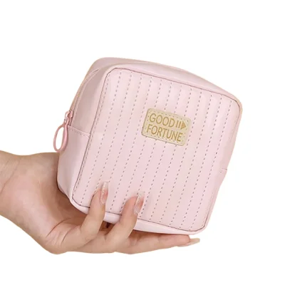 Torbica za higienske vložke - diskretna in prenosna Pink