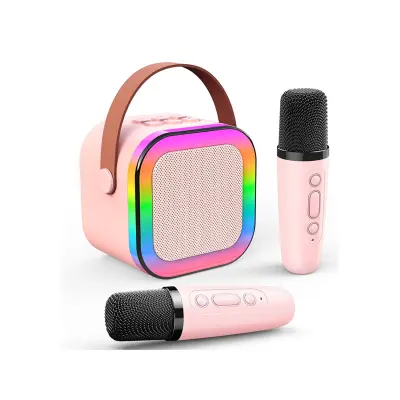 Mini brezžične karaoke z 2 mikrofonoma in svetlobnimi učinki Model KidStar, Roza