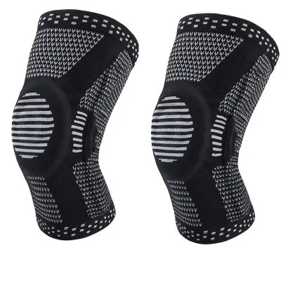 Črna opornica za koleno z vzmetno podporo in silikonsko blazinico - par  L