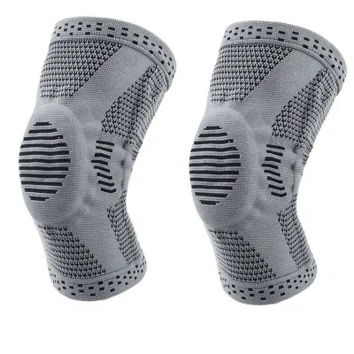 Črno-siv opornik za koleno z vzmetno podporo in silikonsko blazinico (enojni)  L