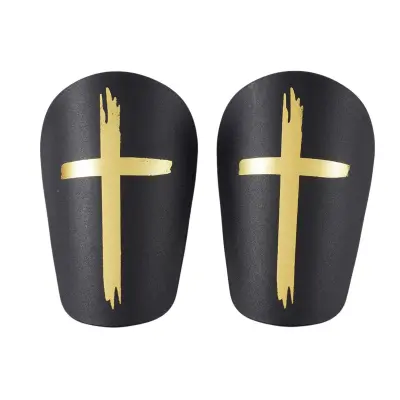 Nogometni ščitniki Cross, PU z EVA peno, 8cm x 5cm, 2 kosa Black&Gold
